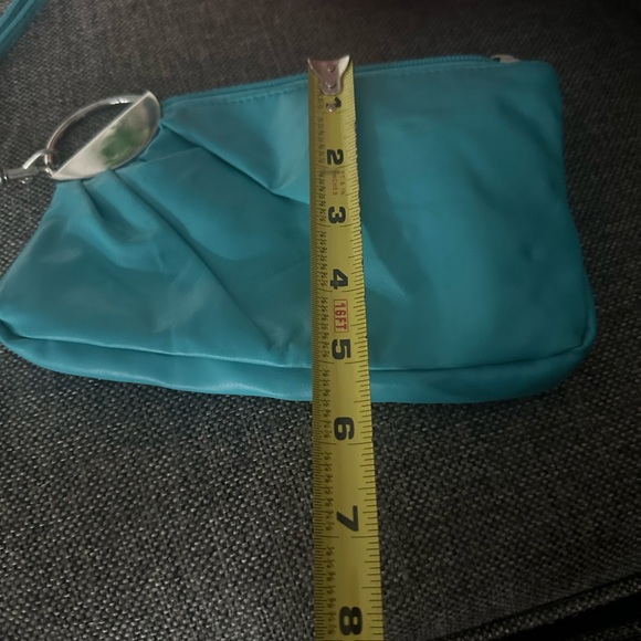 Turquoise Coin Pouch (Vinyl type Material) Interior has a zipper pouch area - Picture 5 of 11